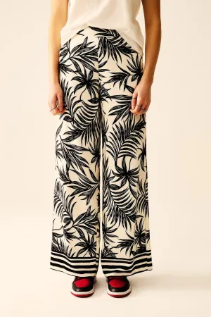 Wide Leg Pants In White With Floral Detail In Black