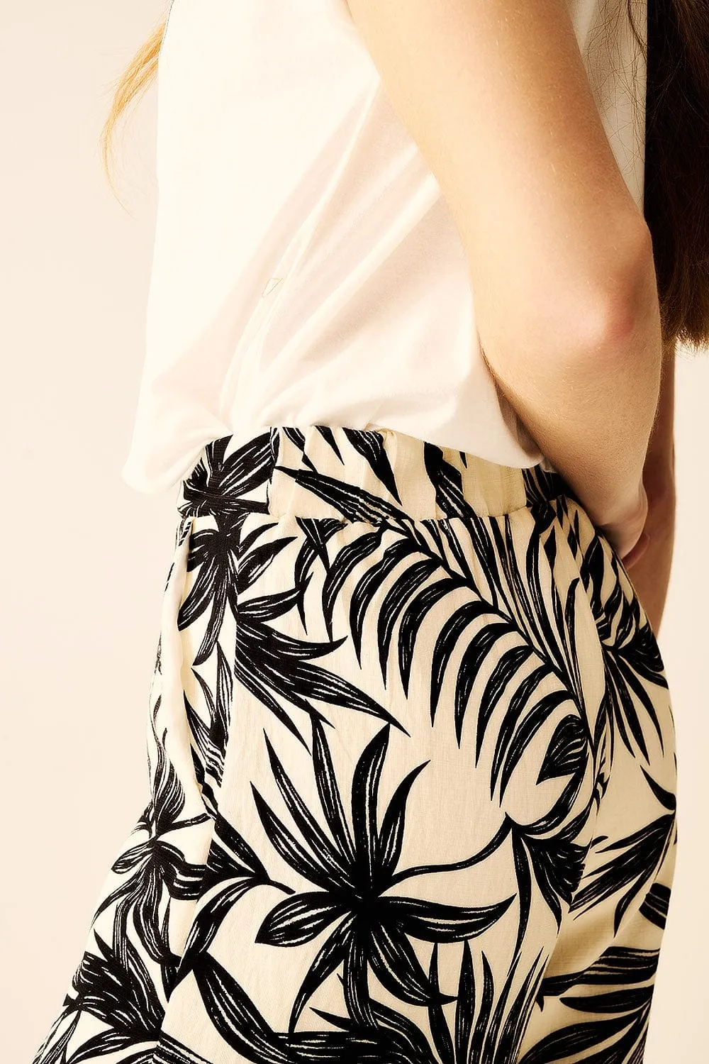 Wide Leg Pants In White With Floral Detail In Black