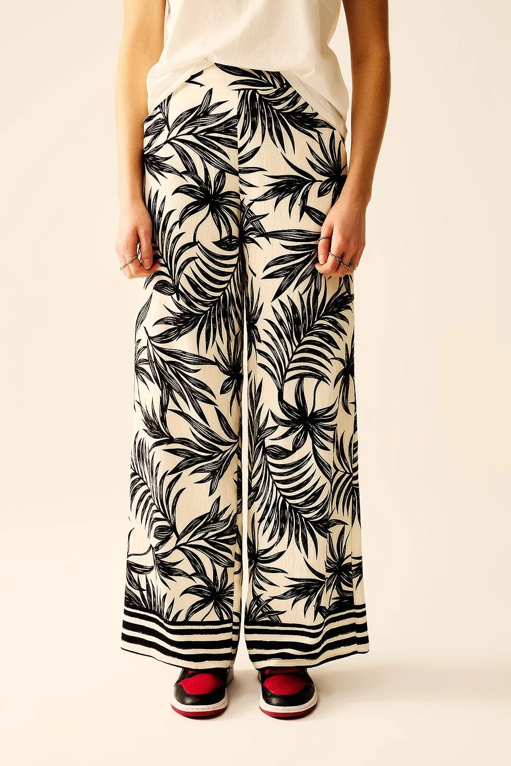 Wide Leg Pants In White With Floral Detail In Black