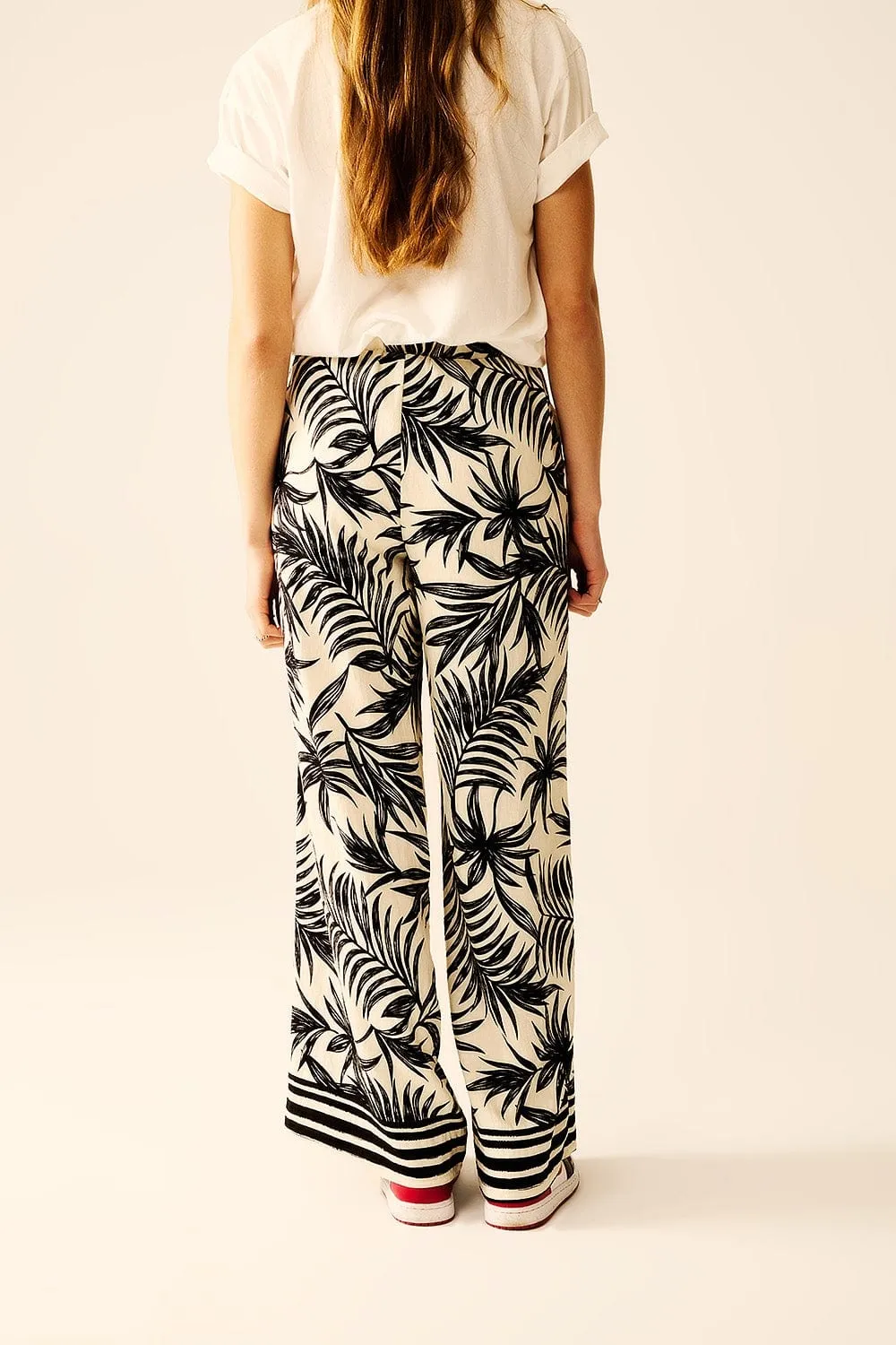Wide Leg Pants In White With Floral Detail In Black